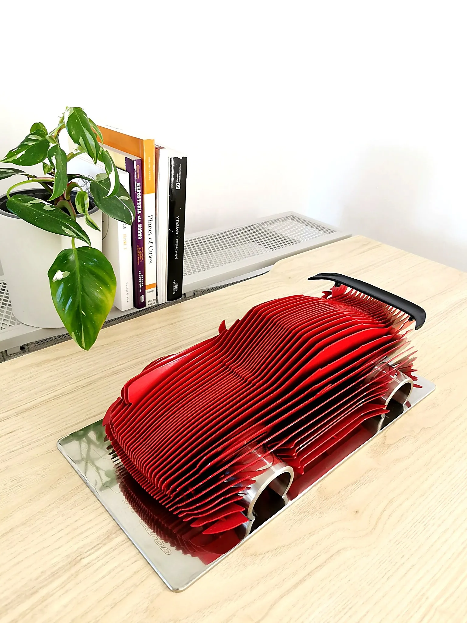 Finished red Porsche 911 sculpture